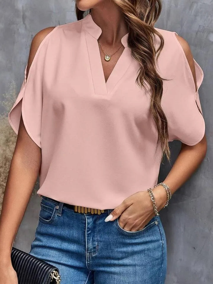 Kris - Effen blouse met inkepingen en eenvoudige elegante split mouwen - Visconte