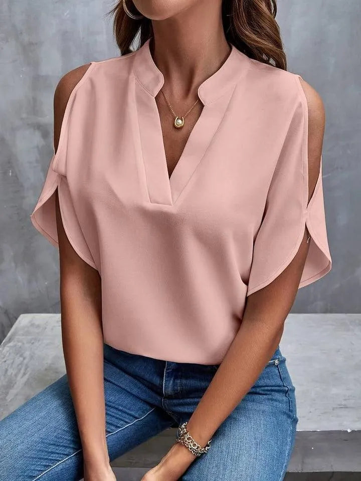 Kris - Effen blouse met inkepingen en eenvoudige elegante split mouwen - Visconte