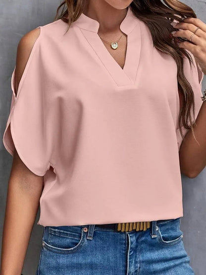 Kris - Effen blouse met inkepingen en eenvoudige elegante split mouwen - Visconte